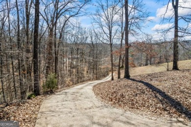 Nestled on over six picturesque acres near the stunning shores on Chestatee Golf Club in Georgia - for sale on GolfHomes.com, golf home, golf lot