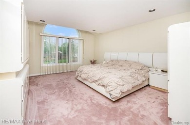 Gorgeous Spacious Contemporary 5 Bedroom Home Situated in a on Knollwood Country Club in Michigan - for sale on GolfHomes.com, golf home, golf lot