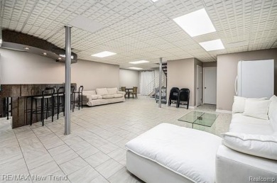 Gorgeous Spacious Contemporary 5 Bedroom Home Situated in a on Knollwood Country Club in Michigan - for sale on GolfHomes.com, golf home, golf lot