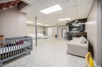 Gorgeous Spacious Contemporary 5 Bedroom Home Situated in a on Knollwood Country Club in Michigan - for sale on GolfHomes.com, golf home, golf lot