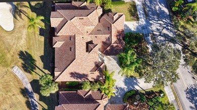 Welcome home to this beautiful golf course retreat. Perfectly on Grand Harbor Golf and Country Club in Florida - for sale on GolfHomes.com, golf home, golf lot