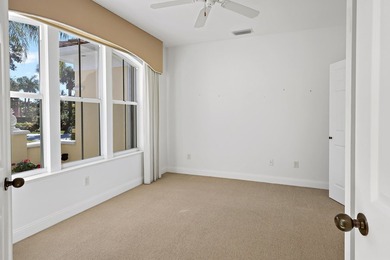 Welcome home to this beautiful golf course retreat. Perfectly on Grand Harbor Golf and Country Club in Florida - for sale on GolfHomes.com, golf home, golf lot