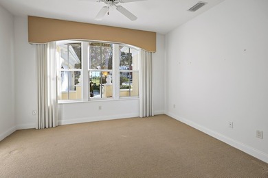 Welcome home to this beautiful golf course retreat. Perfectly on Grand Harbor Golf and Country Club in Florida - for sale on GolfHomes.com, golf home, golf lot