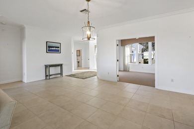 Welcome home to this beautiful golf course retreat. Perfectly on Grand Harbor Golf and Country Club in Florida - for sale on GolfHomes.com, golf home, golf lot