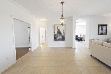 Welcome home to this beautiful golf course retreat. Perfectly on Grand Harbor Golf and Country Club in Florida - for sale on GolfHomes.com, golf home, golf lot