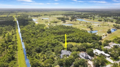 Discover ultimate privacy and tranquility from this luxurious on Jonathans Landing At Old Trail  in Florida - for sale on GolfHomes.com, golf home, golf lot