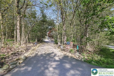 This very well maintained home is ready to be loved by its new on Pocono Farms Country Club in Pennsylvania - for sale on GolfHomes.com, golf home, golf lot