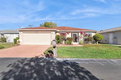 Welcome to this COZY 2 bedroom 2 bath home on a beautiful on Tampa Bay Golf and Country Club in Florida - for sale on GolfHomes.com, golf home, golf lot