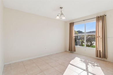 Welcome to this COZY 2 bedroom 2 bath home on a beautiful on Tampa Bay Golf and Country Club in Florida - for sale on GolfHomes.com, golf home, golf lot