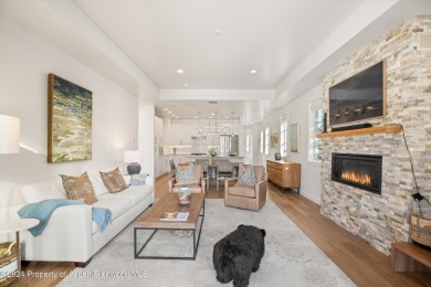 This contemporary, fully-furnished townhome is in the Fairway on River Valley Ranch Golf Club in Colorado - for sale on GolfHomes.com, golf home, golf lot