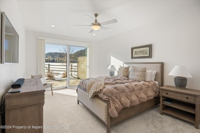 This contemporary, fully-furnished townhome is in the Fairway on River Valley Ranch Golf Club in Colorado - for sale on GolfHomes.com, golf home, golf lot