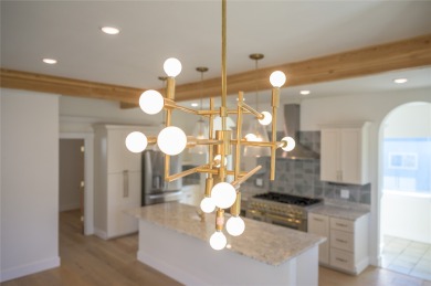 Discover luxury living in this meticulously renovated 4 bed, 2.5 on The Old Works Golf Course in Montana - for sale on GolfHomes.com, golf home, golf lot