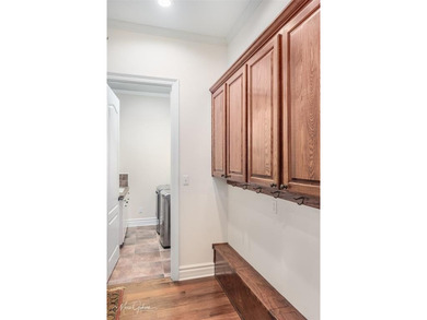 Exquisite one-owner custom home in the highly coveted, gated on Southern Trace Country Club in Louisiana - for sale on GolfHomes.com, golf home, golf lot