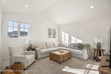 This contemporary, fully-furnished townhome is in the Fairway on River Valley Ranch Golf Club in Colorado - for sale on GolfHomes.com, golf home, golf lot