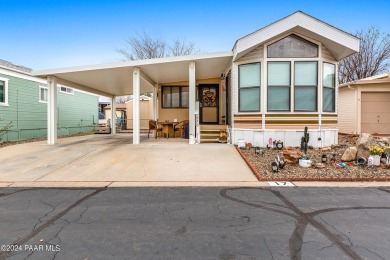 This charming 1 bed+1 bath home is located in the desirable 55+ on Quail Wood Greens Golf Course in Arizona - for sale on GolfHomes.com, golf home, golf lot