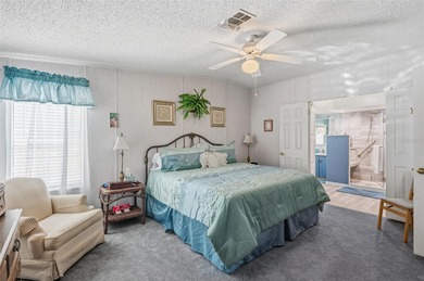 Check out this beautiful, 55+ community that is full of trees on Rivard Golf and Country Club in Florida - for sale on GolfHomes.com, golf home, golf lot