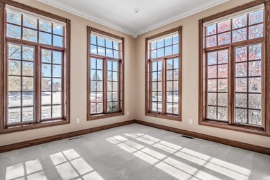 This sophisticated 5,700+ sq. ft. ranch in coveted Sycamore on Sycamore Hills Golf Club in Indiana - for sale on GolfHomes.com, golf home, golf lot