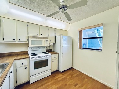 Don't miss out on this 1st floor corner condo. Parking right out on Forest Oaks Golf Club in Florida - for sale on GolfHomes.com, golf home, golf lot