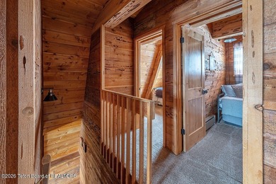 Nestled among a serene canopy of mature trees, this charming on Star Valley RV Golf Course in Wyoming - for sale on GolfHomes.com, golf home, golf lot