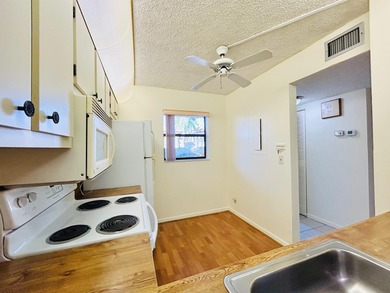 Don't miss out on this 1st floor corner condo. Parking right out on Forest Oaks Golf Club in Florida - for sale on GolfHomes.com, golf home, golf lot