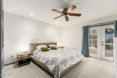Open and bright living spaces flow from the crisp white kitchen on Gainey Ranch Golf Club in Arizona - for sale on GolfHomes.com, golf home, golf lot