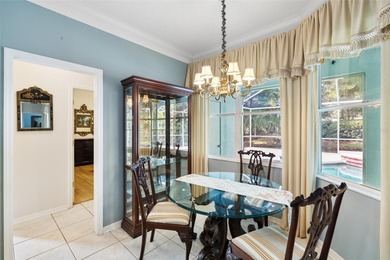 This beautiful home features many upgrades to include crown on River Hills Country Club in Florida - for sale on GolfHomes.com, golf home, golf lot