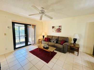 Don't miss out on this 1st floor corner condo. Parking right out on Forest Oaks Golf Club in Florida - for sale on GolfHomes.com, golf home, golf lot
