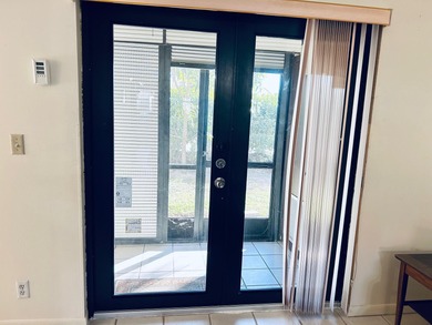 Don't miss out on this 1st floor corner condo. Parking right out on Forest Oaks Golf Club in Florida - for sale on GolfHomes.com, golf home, golf lot