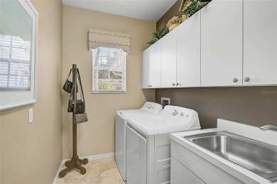 Discover timeless Florida living in this Nisley-built Bermuda on Calusa Lakes Golf Club in Florida - for sale on GolfHomes.com, golf home, golf lot