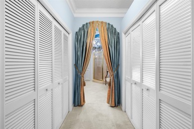 This beautiful home features many upgrades to include crown on River Hills Country Club in Florida - for sale on GolfHomes.com, golf home, golf lot