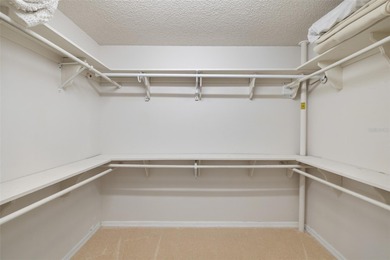 This beautiful home features many upgrades to include crown on River Hills Country Club in Florida - for sale on GolfHomes.com, golf home, golf lot