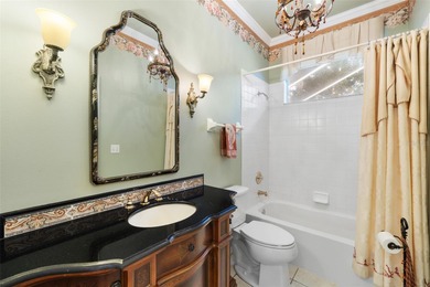 This beautiful home features many upgrades to include crown on River Hills Country Club in Florida - for sale on GolfHomes.com, golf home, golf lot