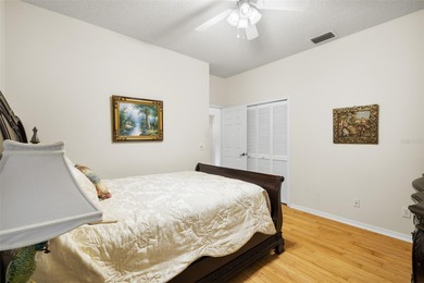 This beautiful home features many upgrades to include crown on River Hills Country Club in Florida - for sale on GolfHomes.com, golf home, golf lot