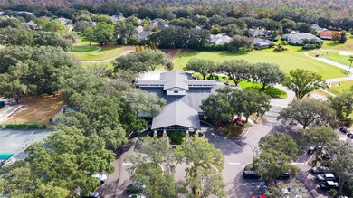 This beautiful home features many upgrades to include crown on River Hills Country Club in Florida - for sale on GolfHomes.com, golf home, golf lot