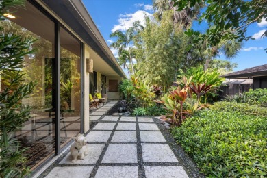 Nestled in the heart of Palm Beach Polo, this lovely 4-bedroom on Palm Beach Polo and Country Club in Florida - for sale on GolfHomes.com, golf home, golf lot