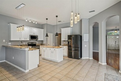 OUTSTANDING VALUE - WELL BELOW MARKET OPPORTUNITY! Unlock the on Lexington Oaks Golf Club in Florida - for sale on GolfHomes.com, golf home, golf lot