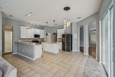 OUTSTANDING VALUE - WELL BELOW MARKET OPPORTUNITY! Unlock the on Lexington Oaks Golf Club in Florida - for sale on GolfHomes.com, golf home, golf lot