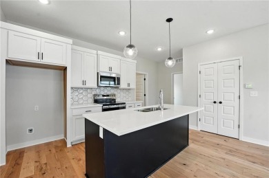 Welcome to the *Sunflower* ranch plan, where simplicity and on Golf Club of Creekmoor in Missouri - for sale on GolfHomes.com, golf home, golf lot