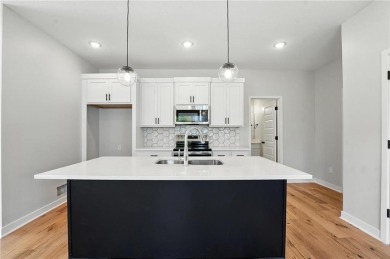 Welcome to the *Sunflower* ranch plan, where simplicity and on Golf Club of Creekmoor in Missouri - for sale on GolfHomes.com, golf home, golf lot
