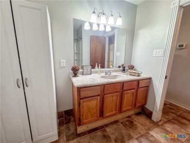 Welcome to this charming 3-bedroom, 2-bathroom brick home on Gatesville Country Club in Texas - for sale on GolfHomes.com, golf home, golf lot