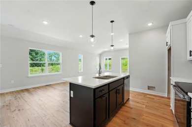 Welcome to the *Sunflower* ranch plan, where simplicity and on Golf Club of Creekmoor in Missouri - for sale on GolfHomes.com, golf home, golf lot