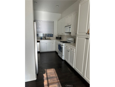 Charming Mediterranean style townhome located in Tustin Ranch on Tustin Ranch Golf Club in California - for sale on GolfHomes.com, golf home, golf lot