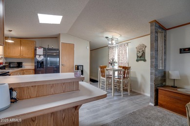 Welcome home to lively resort-style living at La Casa Blanca, a on Apache Creek Golf Club in Arizona - for sale on GolfHomes.com, golf home, golf lot