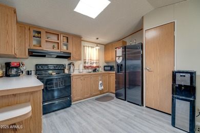 Welcome home to lively resort-style living at La Casa Blanca, a on Apache Creek Golf Club in Arizona - for sale on GolfHomes.com, golf home, golf lot