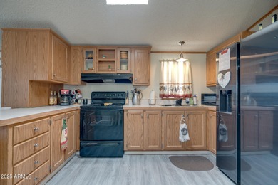 Welcome home to lively resort-style living at La Casa Blanca, a on Apache Creek Golf Club in Arizona - for sale on GolfHomes.com, golf home, golf lot