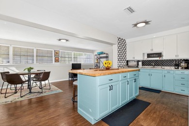 Beautifully renovated Florida cottage packed with coastal charm on Saint Josephs Bay Country Club in Florida - for sale on GolfHomes.com, golf home, golf lot