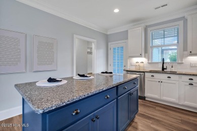 This beautiful and well-maintained coastal home is within on Cape Fear National At Brunswick Forest in North Carolina - for sale on GolfHomes.com, golf home, golf lot