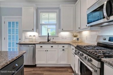 This beautiful and well-maintained coastal home is within on Cape Fear National At Brunswick Forest in North Carolina - for sale on GolfHomes.com, golf home, golf lot