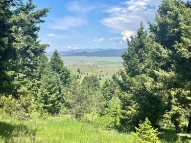 This is a one of a kind property nestled on the mountainside on Fairmont Hot Springs Resort in Montana - for sale on GolfHomes.com, golf home, golf lot