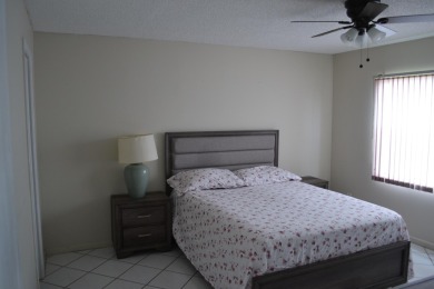 Recently renovated 2/2 Condominium with a Nice Lake View located on Sunrise Lakes Phase III in Florida - for sale on GolfHomes.com, golf home, golf lot